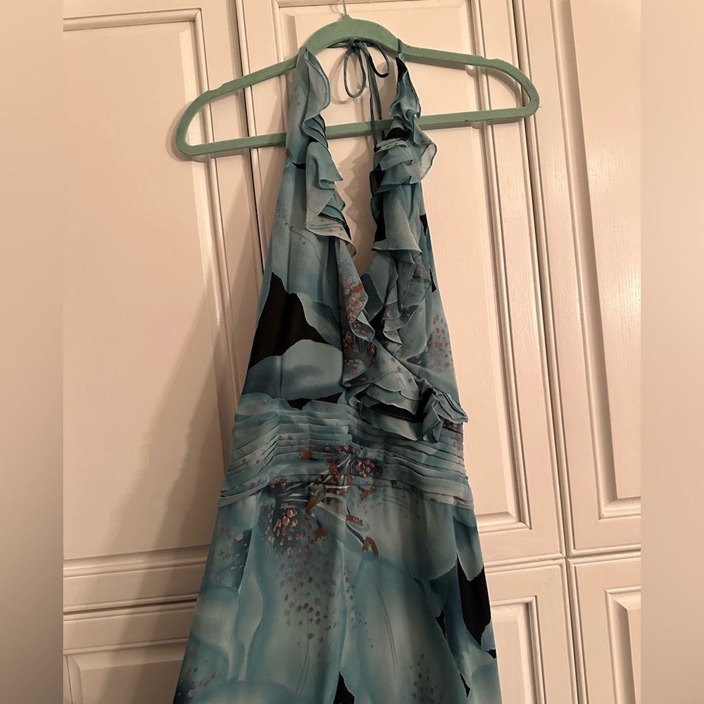 Beautiful blue with gold floral pattern. Perfect for a summer night!